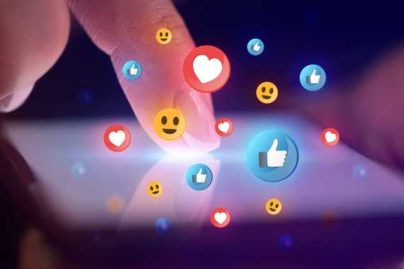 Finger touching phone with social media concept